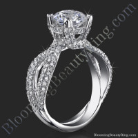Micropave Diamonds On Elegant Criss Cross Designer Band And Glistening Gold Prongs